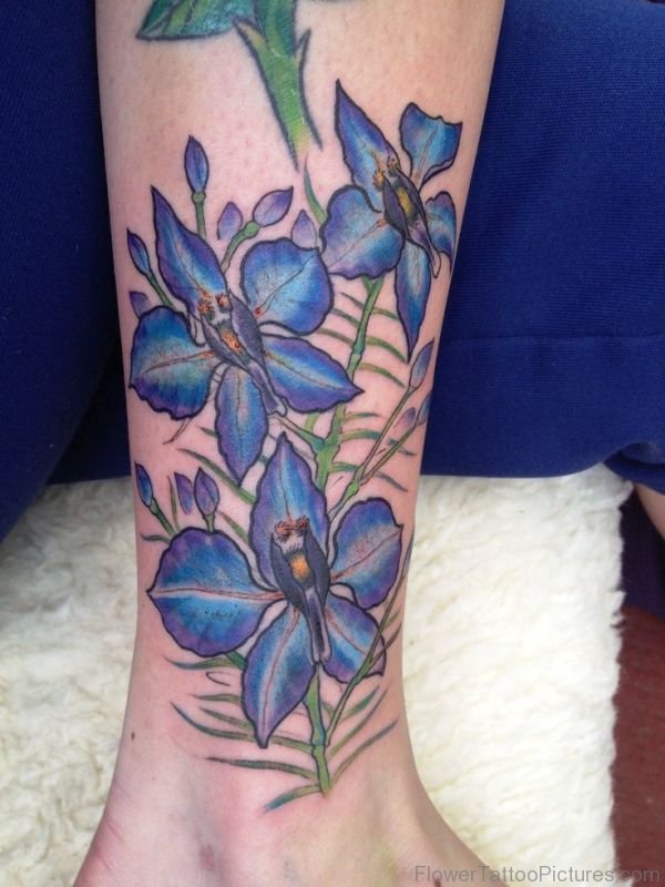 Blue Larkspur Flower Tattoo On Leg