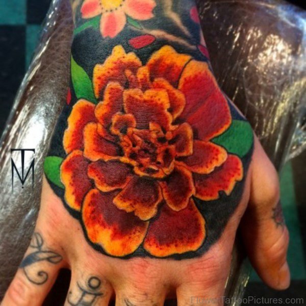 Brilliant Marigold Flower Tattoo On Hand