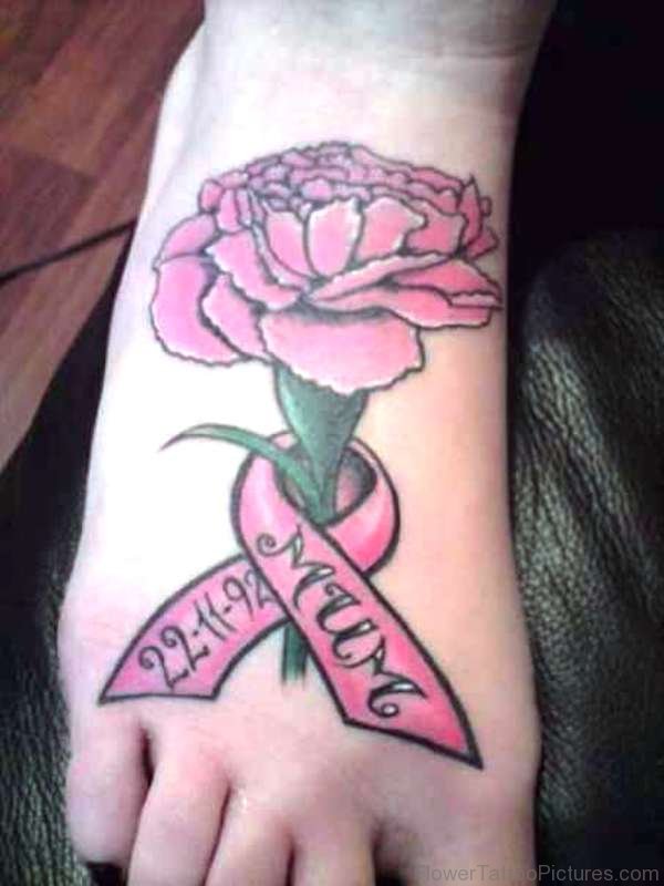 Carnation With Ribbon Tattoo On Foot