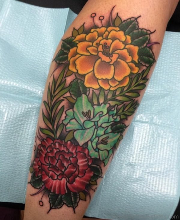 Colored Marigold Flower Tattoo On Arm