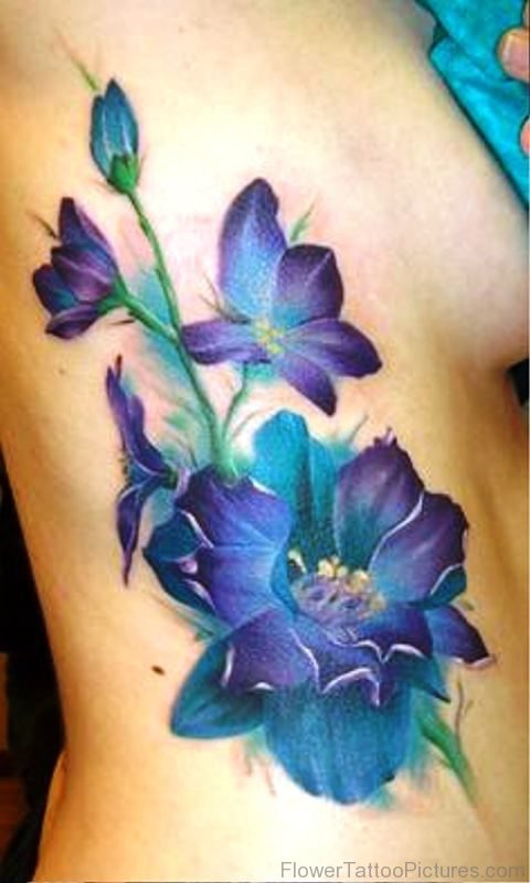 Cool Larkspur Flower Tattoo On Rib