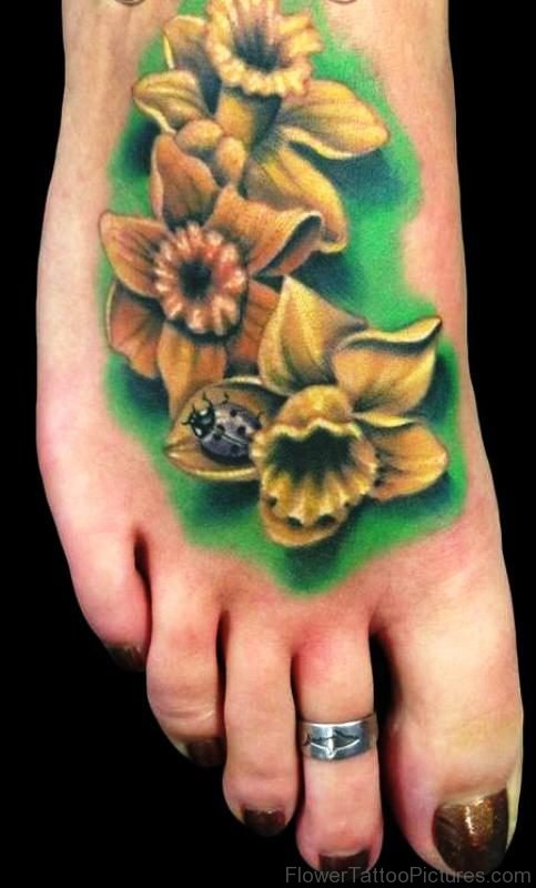 Daffodil Flowers Tattoo On Foot Image