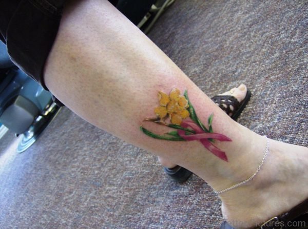 Daffodil With Cancer Ribbon Tattoo