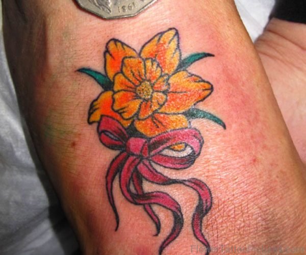 Daffodil With Pink Bow Tattoo