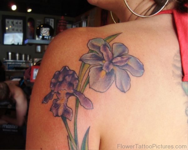 Delightful Iris Flower Tattoo On Shoulder