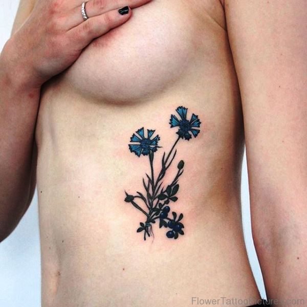 Elegant Cornflowers Tattoo On Rib