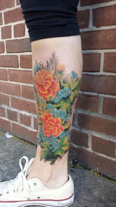 Excellent Marigold Flower Tattoo On Leg