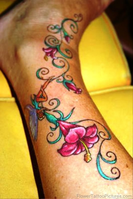 Fairy Orchid Flower Tattoo On Leg