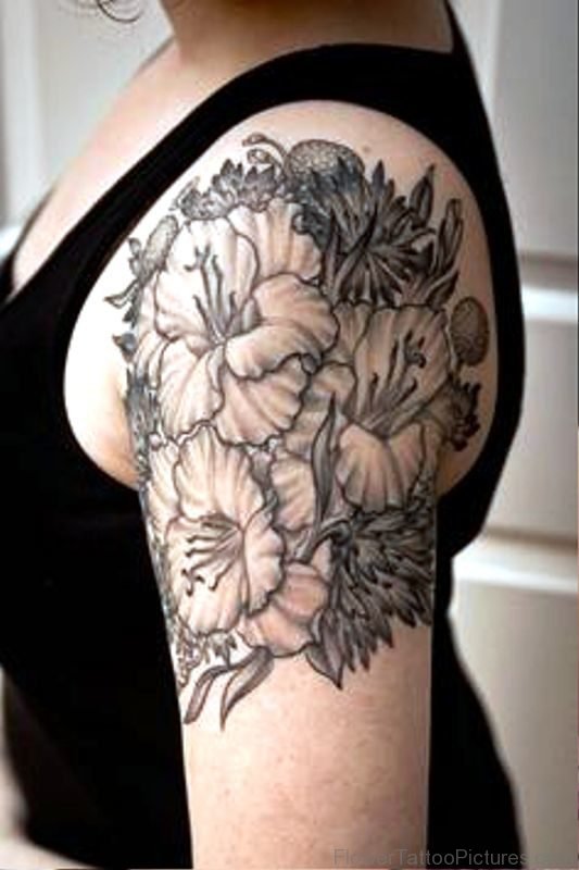 Great Gladiolus Flower Tattoo On Shoulder