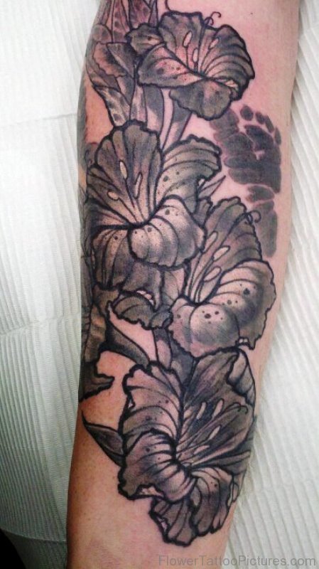 Grey Gladiolus Flower Tattoo On Leg