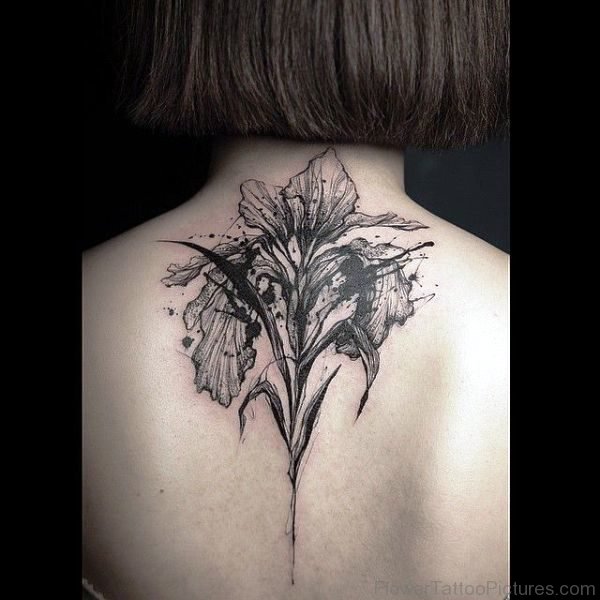 Grey Inked Iris Flower Tattoo On Back