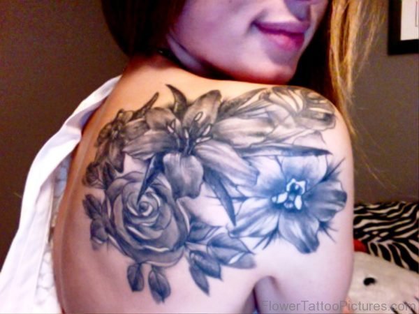 Grey Larkspur Flower Tattoo On Shoulder