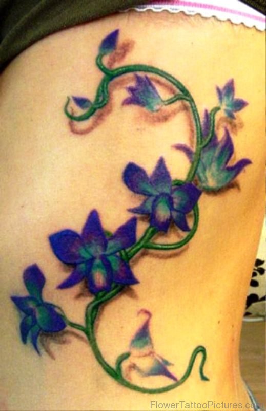 Larkspur Flower Vine Tattoo On Rib