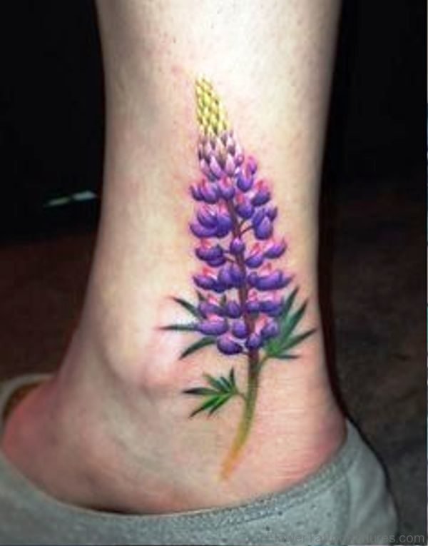 Little Larkspur Flower Tattoo On Ankle