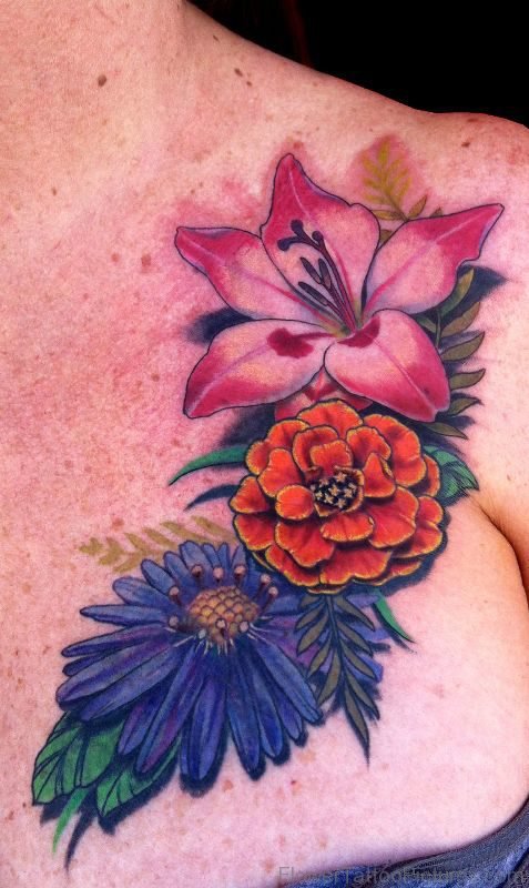 Marigold Flower With Other Flowers Tattoo