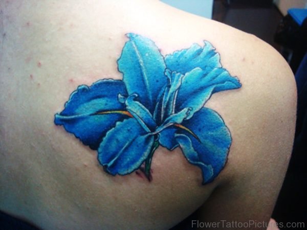 Nice Blue Iris Flower Tattoo On Shoulder