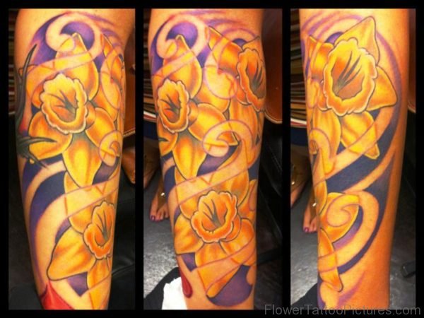 Nice Daffodil Flowers Tattoo On Leg