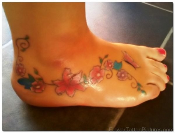 Nice Orchid Flower Tattoo On Foot