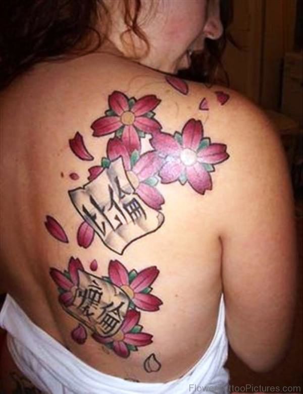 Orchid Flower With Japenese Wording Tattoo