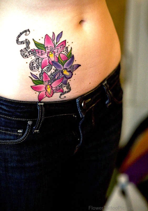 Orchid Flower With Music Tattoo Design