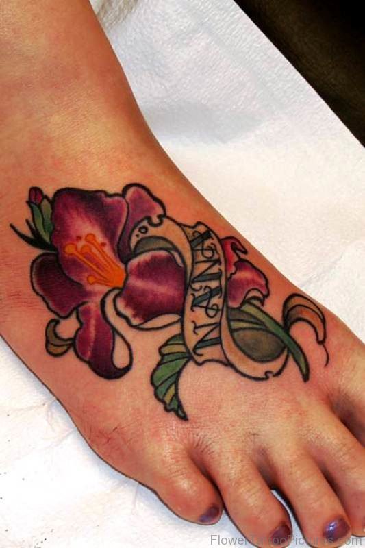 Outstanding Gladiolus Flower Tattoo On Foot