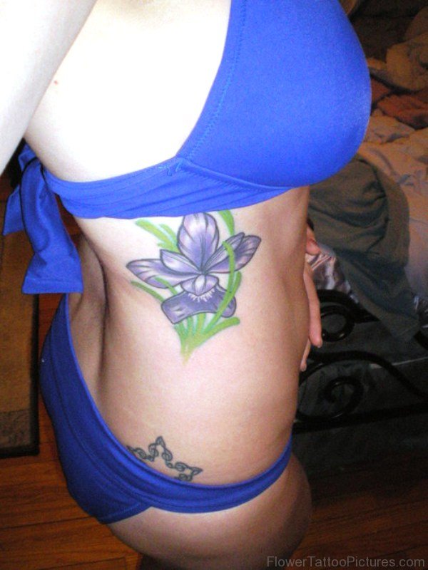 Outstanding Iris Flower Tattoo On Rib
