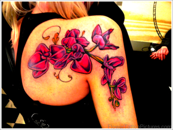 Pretty Orchid Flowers Tattoo On Shoulder