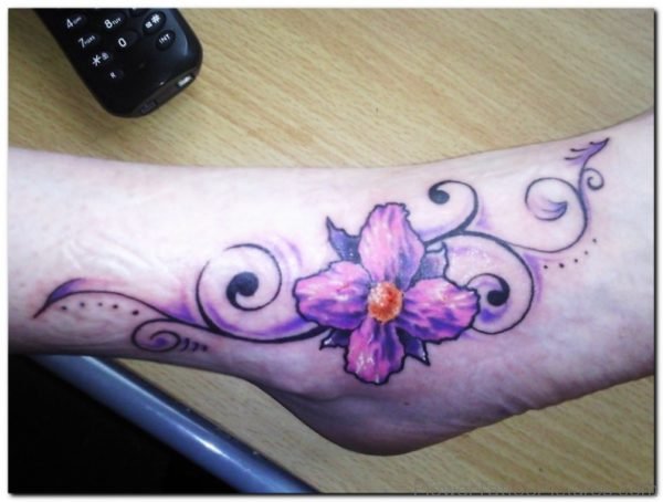 Purple Orchid Flower Tattoo On Foot