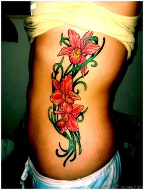 Red Orchid Flowers Tattoo On Rib
