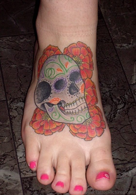 Skull On Marigold Flower Tattoo On Foot
