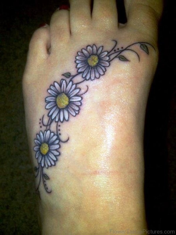 Small Barberton Flowers Tattoo On Foot