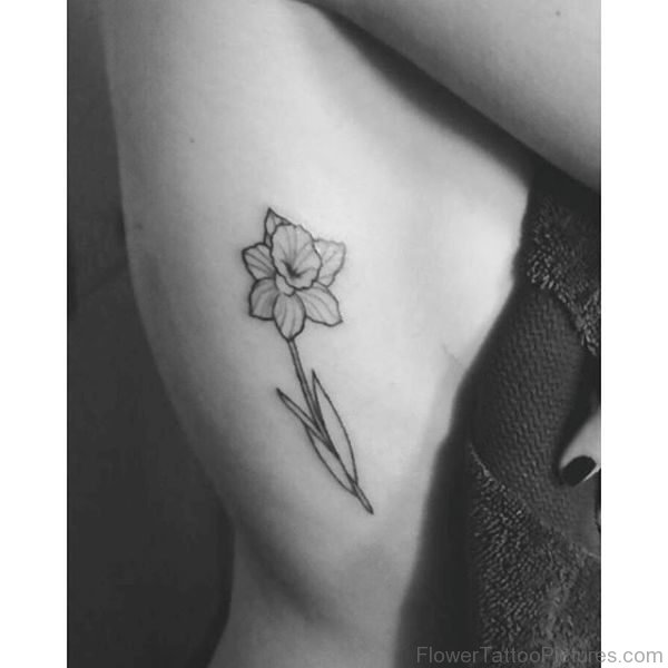 Small Daffodil Tattoo On Rib