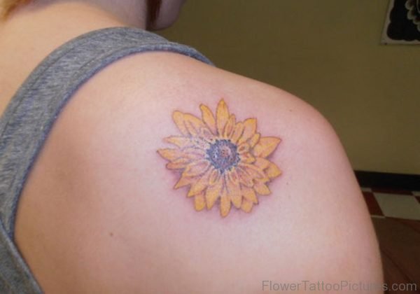 Small Marigold Flower Tattoo On Shoulder