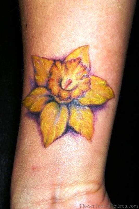 Yellow Daffodil Flower Tattoo On Wrist