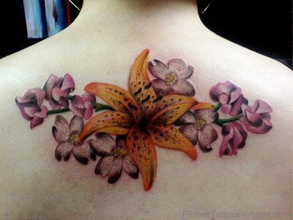 Yellow Orchid Flower Tattoo On Back